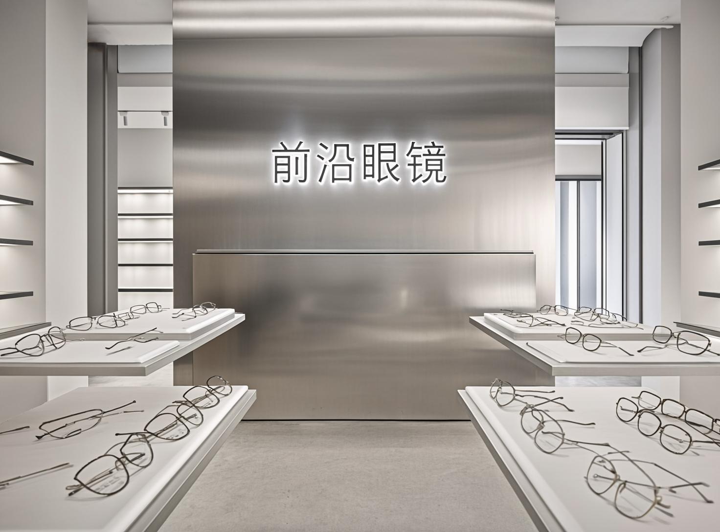 AI Image Generator - GLM Image (Z.AI): High-end commercial advertisement photography for a modern optical store. A sleek, ...